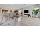 Spacious living room with a fireplace, mounted TV, and an open floor plan at , Henderson, NV 89011