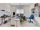 Bright office space with a large window and built-in shelving at , Henderson, NV 89011