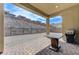 Outdoor patio with brick pavers and a built-in grill, perfect for entertaining with mountain views at , Henderson, NV 89011
