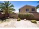 Landscaped backyard featuring desert landscaping, patio, and privacy wall at , North Las Vegas, NV 89084