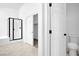 This bathroom offers a black framed glass shower, closet and toilet at , North Las Vegas, NV 89084
