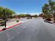 Gated community entrance surrounded by lush trees and desert landscaping at , North Las Vegas, NV 89084