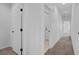 Hallway with carpet flooring leading to various rooms in the house at , North Las Vegas, NV 89084