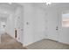 Hallway featuring tile flooring at the entrance and carpet leading to the bedrooms at , North Las Vegas, NV 89084