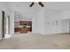 Open-concept living room featuring high ceilings and seamless flow to the kitchen at , North Las Vegas, NV 89084