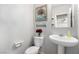 Charming powder room features stylish decor, adding a touch of elegance to the home at 10086 Adina Ct, Las Vegas, NV 89141