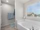 Relaxing bathroom with a soaking tub and separate shower at 10086 Adina Ct, Las Vegas, NV 89141