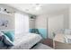 Cozy bedroom featuring playful decor and a comfortable bed at 10086 Adina Ct, Las Vegas, NV 89141