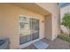 Outdoor patio with sliding glass doors that let in natural light, perfect for relaxing at 10456 Prairie Schooner Ave, Las Vegas, NV 89129
