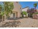 Fully landscaped backyard, a private area, perfect for hosting gatherings or relaxing in a serene setting at 10456 Prairie Schooner Ave, Las Vegas, NV 89129