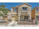 Attractive two-story home with an attached garage, covered porch, and well-maintained landscaping at 10456 Prairie Schooner Ave, Las Vegas, NV 89129