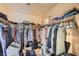 Walk-in closet with organized racks and shelving, offering ample storage space for clothing and accessories at 10456 Prairie Schooner Ave, Las Vegas, NV 89129