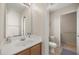 Bright bathroom featuring modern fixtures and carpeted flooring at 10468 Concetta Ave, Las Vegas, NV 89129