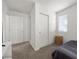 Bedroom with lots of natural light, plush carpeting, and an attached closet; this room creates a cozy retreat at 10468 Concetta Ave, Las Vegas, NV 89129