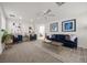 Bright living room with modern decor, plush seating, and stylish accents, creating a welcoming atmosphere at 10468 Concetta Ave, Las Vegas, NV 89129