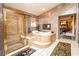 Stunning bathroom with luxurious soaking tub, glass shower, and elegant tile accents at 10798 Tapestry Winds St, Las Vegas, NV 89141