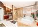 Spacious primary bathroom features a jetted tub and a separate shower at 10798 Tapestry Winds St, Las Vegas, NV 89141