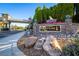 Stone community sign with immaculate landscaping at the entrance to Aberdeen at 10798 Tapestry Winds St, Las Vegas, NV 89141