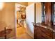 Inviting entryway featuring hardwood floors, decorative molding, and elegant furnishings at 10798 Tapestry Winds St, Las Vegas, NV 89141