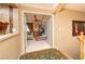 Hallway with decor and a view of the living room at 10798 Tapestry Winds St, Las Vegas, NV 89141