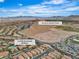 A lovely aerial view shows the property's close proximity to the Olympia Sports Park and beautiful mountain views at 11076 Zampino St, Las Vegas, NV 89141