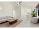 Spacious living room featuring tile floors and neutral wall paint at 11076 Zampino St, Las Vegas, NV 89141