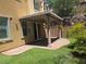 Charming backyard with a covered patio and manicured lawn at 11298 Corsica Mist Ave, Las Vegas, NV 89135