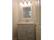 Bathroom featuring a white vanity with modern fixtures and a bright mirror at 11298 Corsica Mist Ave, Las Vegas, NV 89135