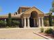 A beautiful clubhouse featuring a grand entrance with columns and arched entry at 11298 Corsica Mist Ave, Las Vegas, NV 89135