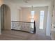 Hallway with dark iron railing and wood trim at 11298 Corsica Mist Ave, Las Vegas, NV 89135