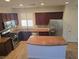 Spacious kitchen with stainless steel appliances, granite countertops, and tile flooring at 11298 Corsica Mist Ave, Las Vegas, NV 89135