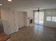 Cozy living room features tile floors, fireplace, and sliding door to backyard at 11298 Corsica Mist Ave, Las Vegas, NV 89135