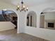 View of staircase, kitchen, living spaces showing open floor plan and design at 11298 Corsica Mist Ave, Las Vegas, NV 89135