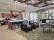 Comfortable lounge area with kitchen, seating, modern decor and plenty of space to relax at 11298 Corsica Mist Ave, Las Vegas, NV 89135