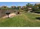 Community picnic area with BBQ grills and picnic tables on a grassy lawn at 11298 Corsica Mist Ave, Las Vegas, NV 89135