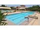 Beautiful community pool with lounge chairs and ample space for relaxation at 11298 Corsica Mist Ave, Las Vegas, NV 89135