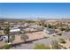 Spacious aerial view showcasing large lot size and mountain views in residential community with beautiful blue skies at 1227 San Gabriel Ave, Henderson, NV 89002