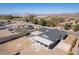 A beautiful aerial view of the neighborhood with desert landscape, roof, and covered area at 1227 San Gabriel Ave, Henderson, NV 89002