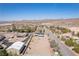 Expansive aerial view of neighborhood showcasing desert landscape and mountain views at 1227 San Gabriel Ave, Henderson, NV 89002