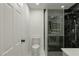 Bathroom featuring a toilet and modern walk-in shower with dark marble tiling at 1227 San Gabriel Ave, Henderson, NV 89002
