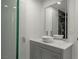 Bright bathroom with a modern vanity, vessel sink, and walk-in shower with glass door at 1227 San Gabriel Ave, Henderson, NV 89002
