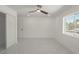 Bright bedroom with marble floors, a ceiling fan, closet, and a window with a view at 1227 San Gabriel Ave, Henderson, NV 89002