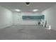 Spacious garage with cabinetry along the back wall, offering ample storage space at 1227 San Gabriel Ave, Henderson, NV 89002