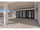 Covered patio with pillars, exterior access, concrete slab, and minimalist design at 1227 San Gabriel Ave, Henderson, NV 89002