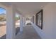 Covered walkway providing shade, with windows and columns adding visual interest at 1227 San Gabriel Ave, Henderson, NV 89002