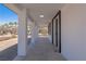 Covered walkway showcasing columns and windows, adding architectural detail to the exterior at 1227 San Gabriel Ave, Henderson, NV 89002