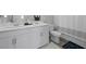 Bathroom featuring a double vanity sink and tub at 12525 Lylan Ridge St, Las Vegas, NV 89138