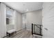 Hallway area with a bench, door and railing at 12525 Lylan Ridge St, Las Vegas, NV 89138