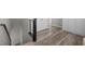 Hallway with modern railing, closet and wood flooring at 12525 Lylan Ridge St, Las Vegas, NV 89138