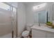 Clean bathroom with shower, white toilet, sink, and quartz countertop at 1371 Cumulus Ct, Henderson, NV 89014